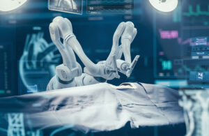 Surgery Patient Laying On Surgical Table. Robot Arms Performing High-Precision Nanosurgery In Hospital. Automated Robotic Limbs Operating, VFX Holographic Displays Showing Heartbeat, Blood Pressure. The regulatory nod for Ottava allows Johnson & Johnson MedTech to begin a clinical trial for the surgical robot at U.S. sites.