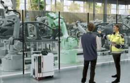 ABB Robotics offers its Energy Efficiency Service, as shown here with a technician and a factory customer.