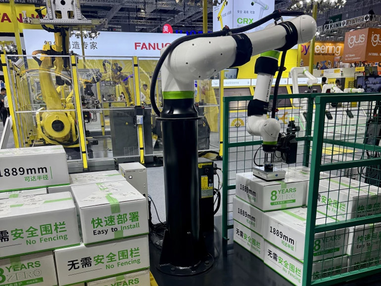 FANUC demonstrates palletizing robots in Shanghai, China.