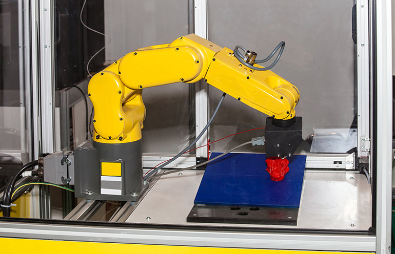 Robotic arms in large-scale 3D printing, as described by Replique.