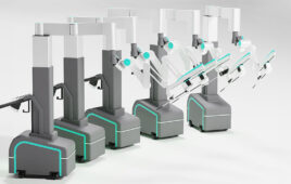 Five white surgical robotic arms on grey and blue carts from SS Innovations.